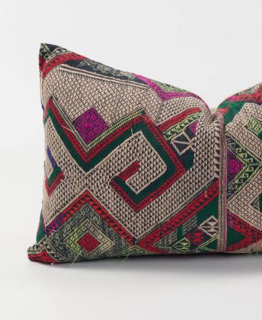A Tai Lue hill tribe blanket turned into a unique silk and cotton throw cushion.