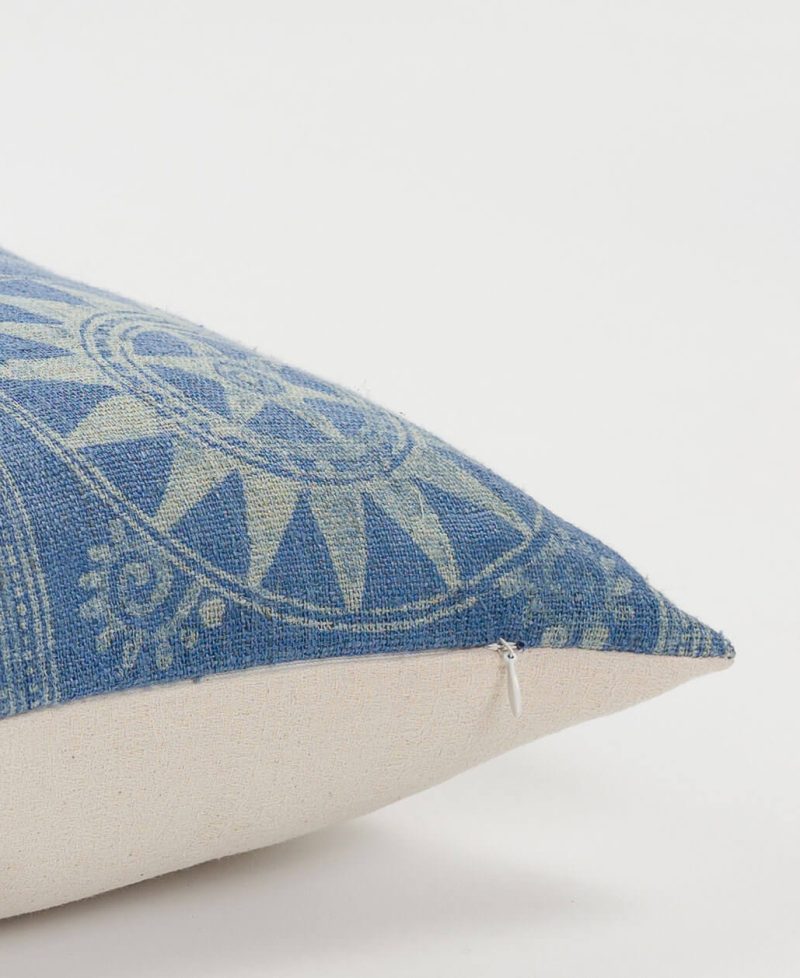 A cushion cover featuring a hidden zip and a bamboo fiber back.