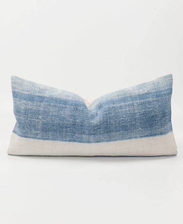 A cushion cover made from vintage indigo textiles.