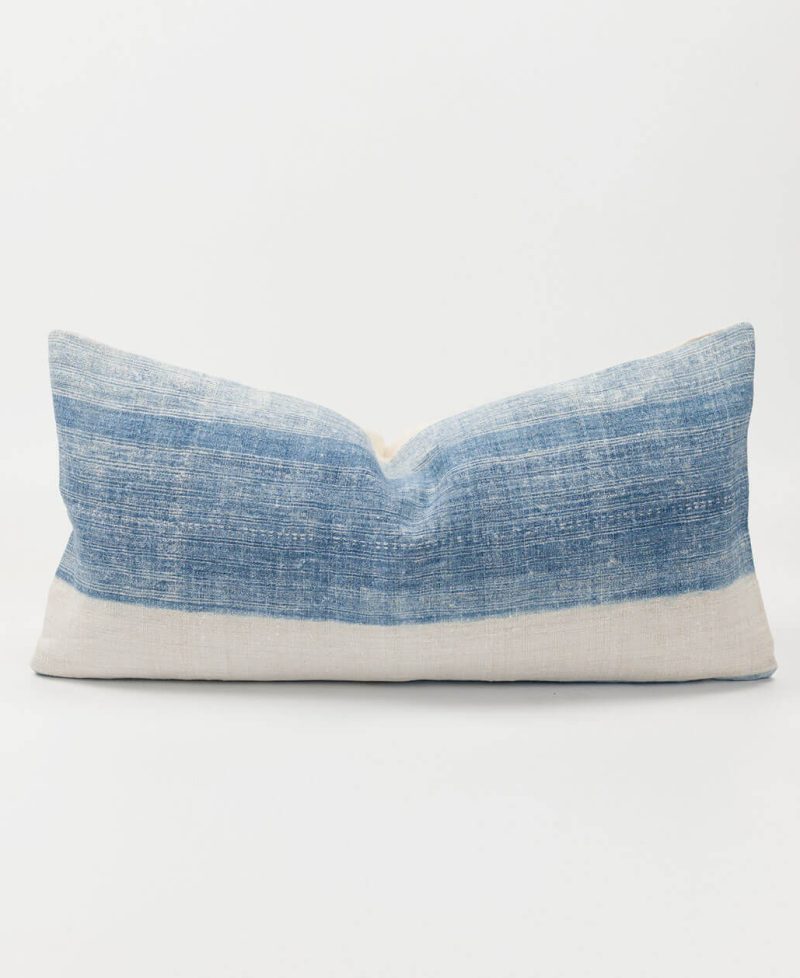 A cushion cover made from vintage indigo textiles.