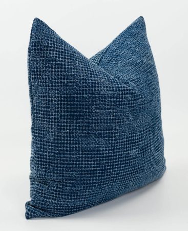 A double-sided navy stonewash cushion cover.