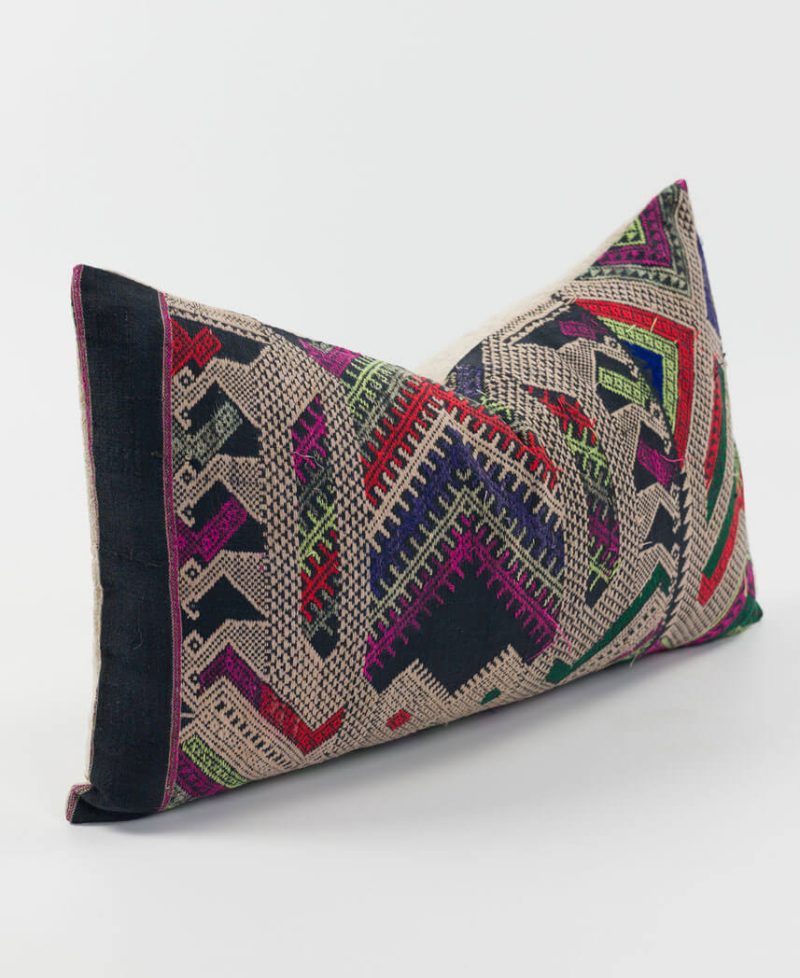 A geometric pillow cover design using upcycled vintage fabric.