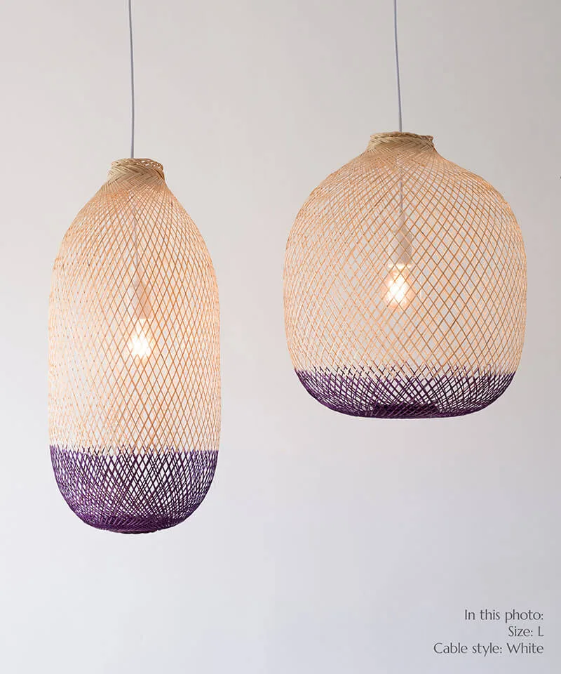 A pair of purple pendant light shades with contemporary white color light fixtures.