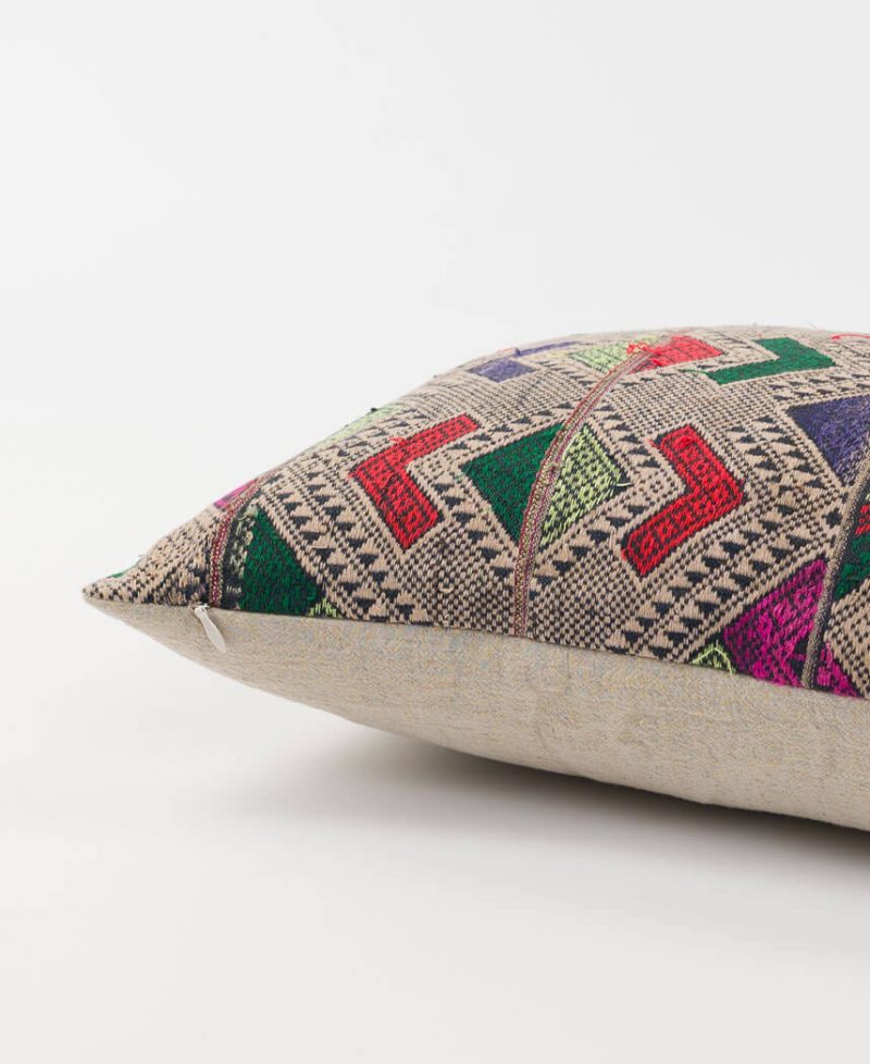 A silk and cotton accent cushion with flat linen reverse.