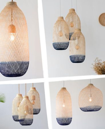 A variety of hanging pendant lights with navy blue accents.