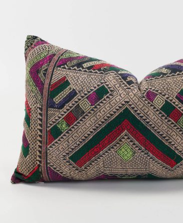 An ethnic hill tribe pillow cover made from vintage fabric and textiles.
