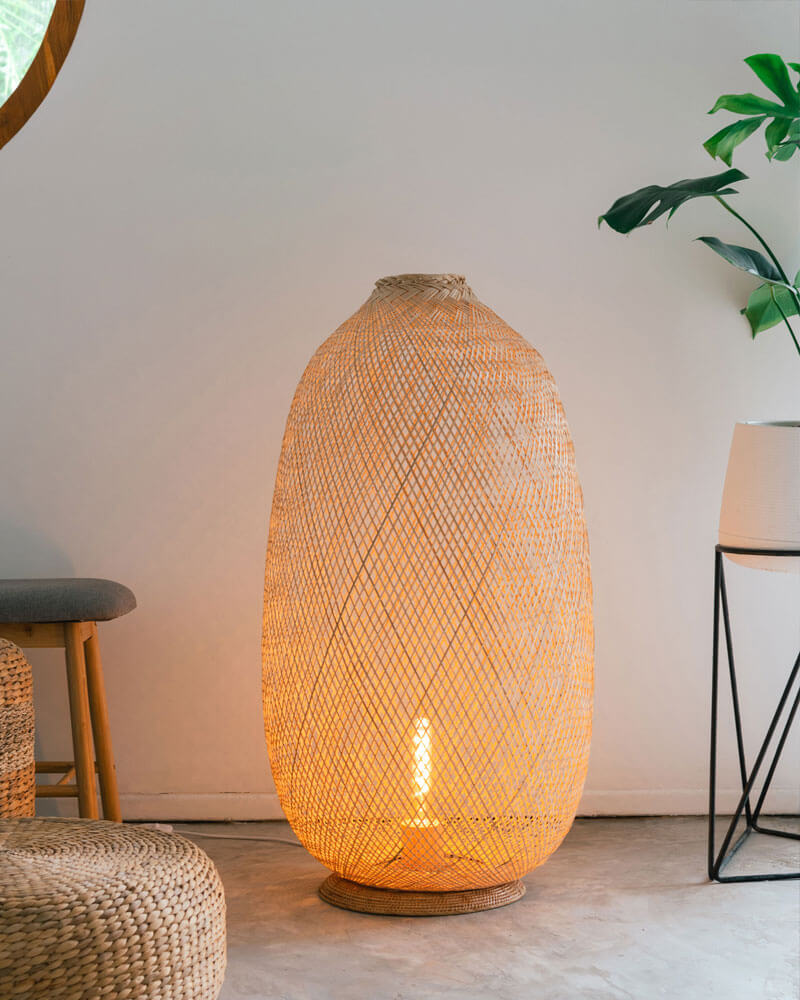 An oversized bamboo floor lamp with biophilic inspiration.