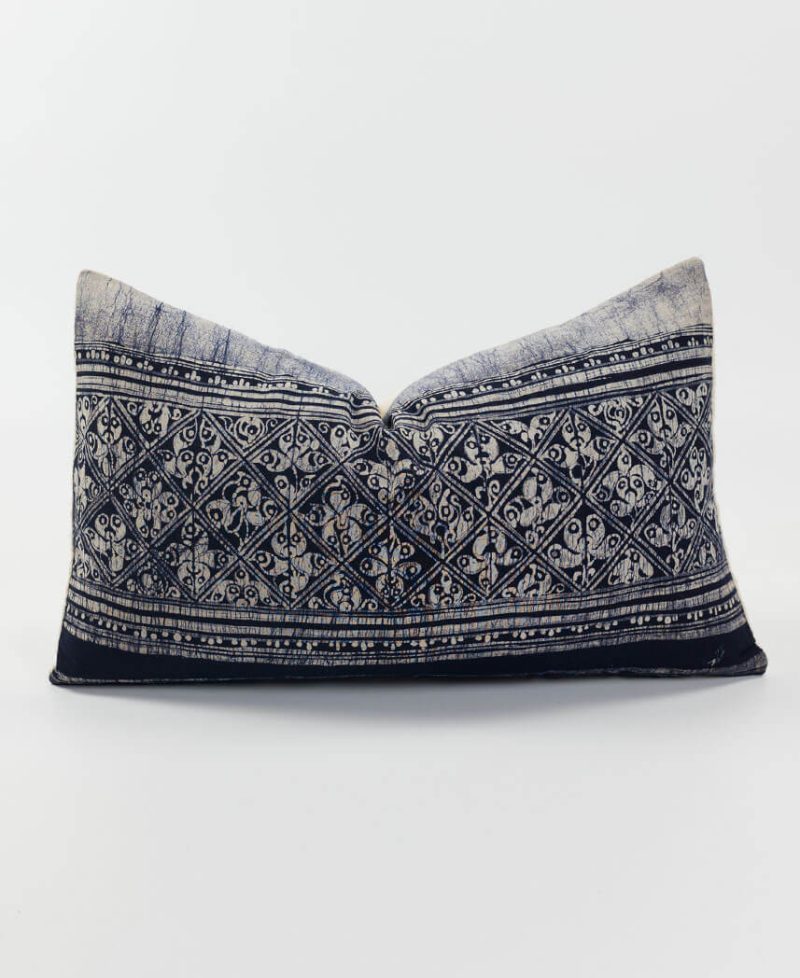 Black and gray cushion with dye staining.