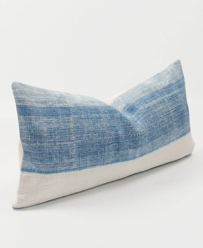 Blue and white striped vintage ethnic cushion.