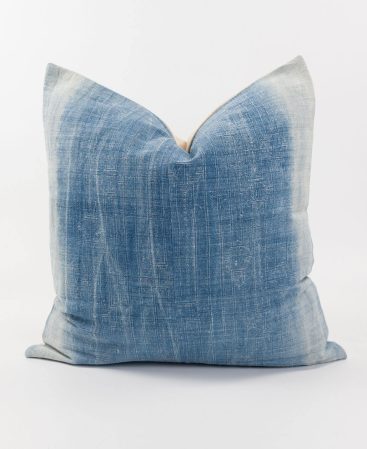 Boho indigo cushion with white stripes.