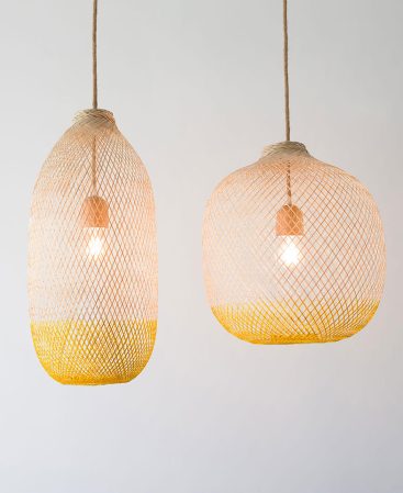 Bright summer yellow pendant light shades made from natural wood.