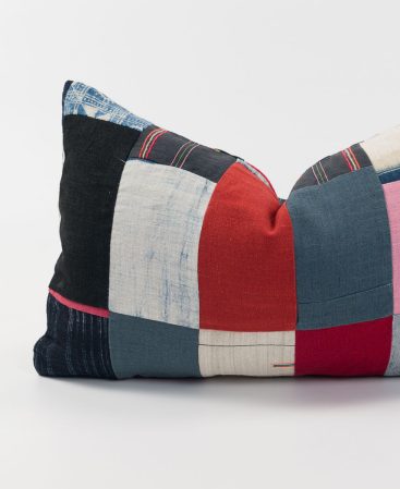 Cotton and hemp textiles are used to create this patchwork cushion cover.