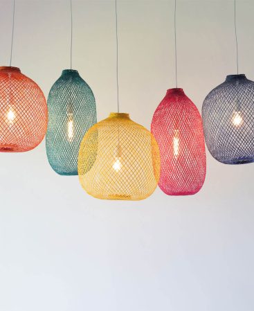 Creative multi-color pendant light shades in orange, pink, yellow, blue and green.