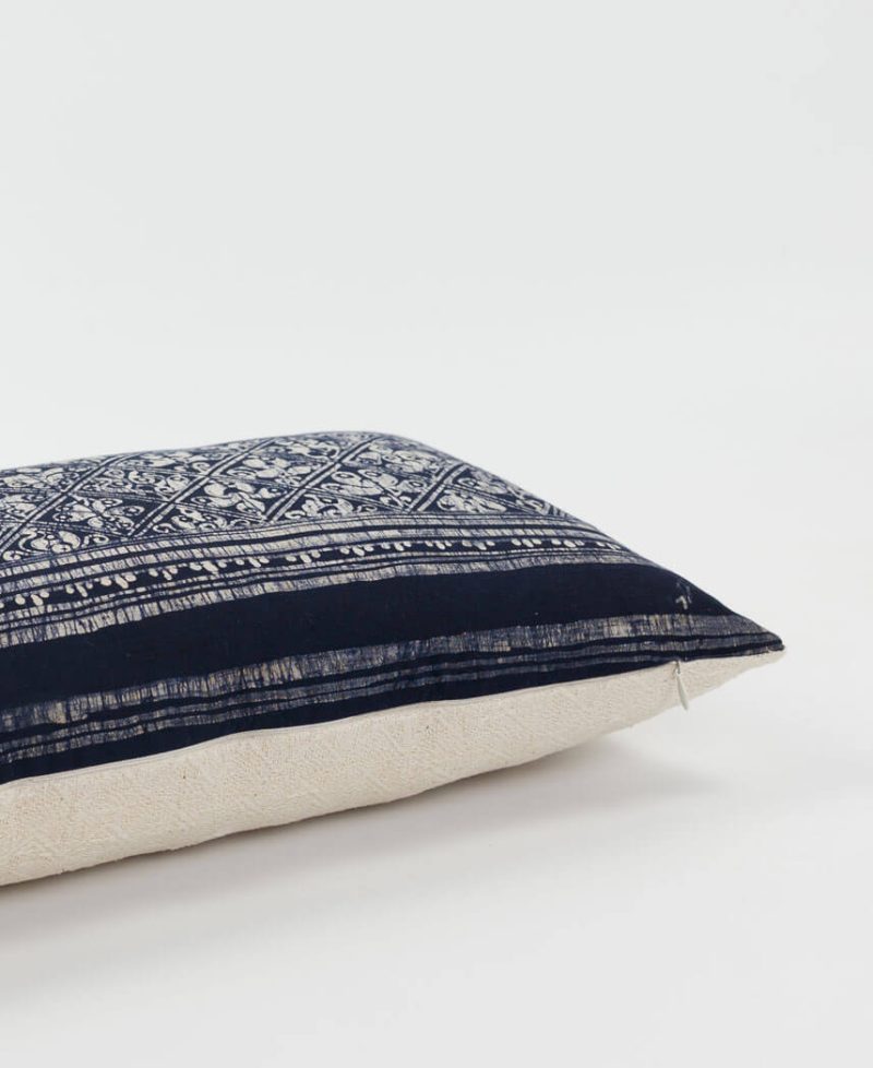 Dark and light colors combine to create this monochrome pillow.