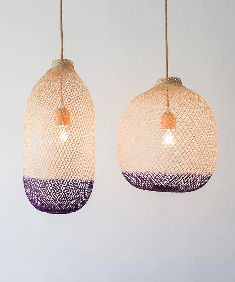 Deep purple color suspended light shades made from bamboo rattan.