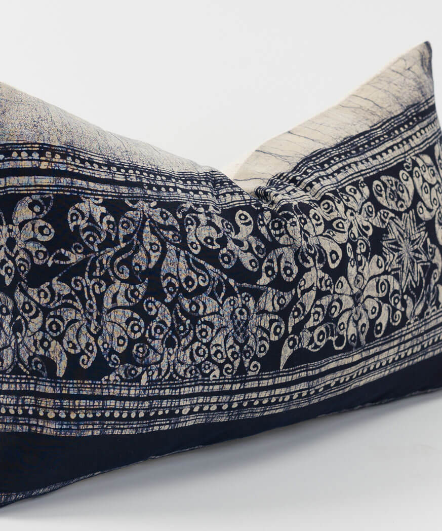Lightweight fabric makes up the front of this lumbar pillow cushion.