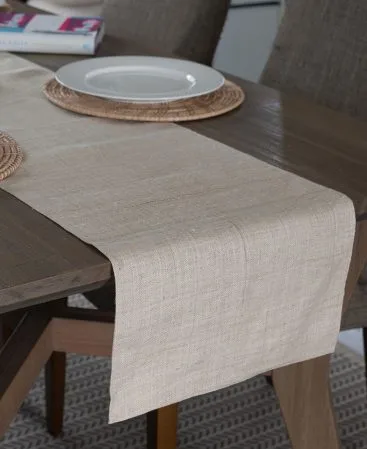 Natural hemp runner for a dining table with a straight cut end.