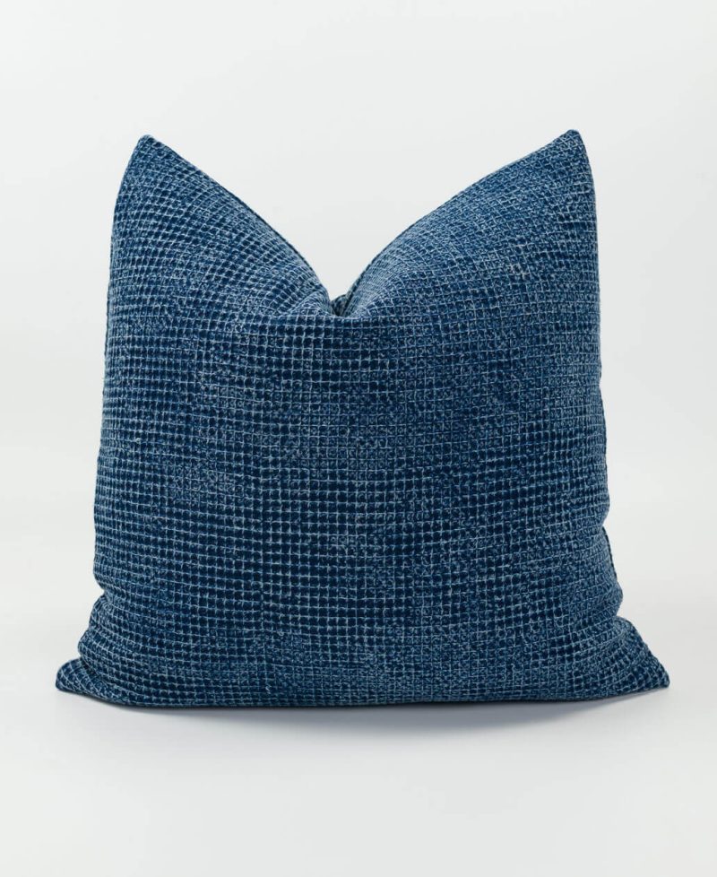 Stonewash style cushion cover with a block texture design.