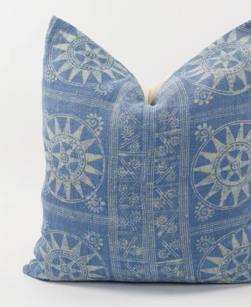 Tribal pillow cover with ethnic textiles.