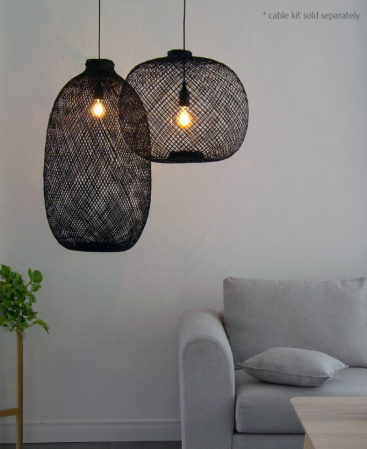Two hanging black bamboo fish trap basket pendant lights.