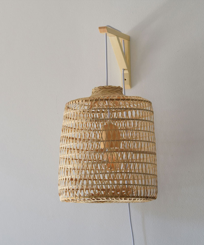 Wall hanging bamboo pendant lamp with aspen bracket.