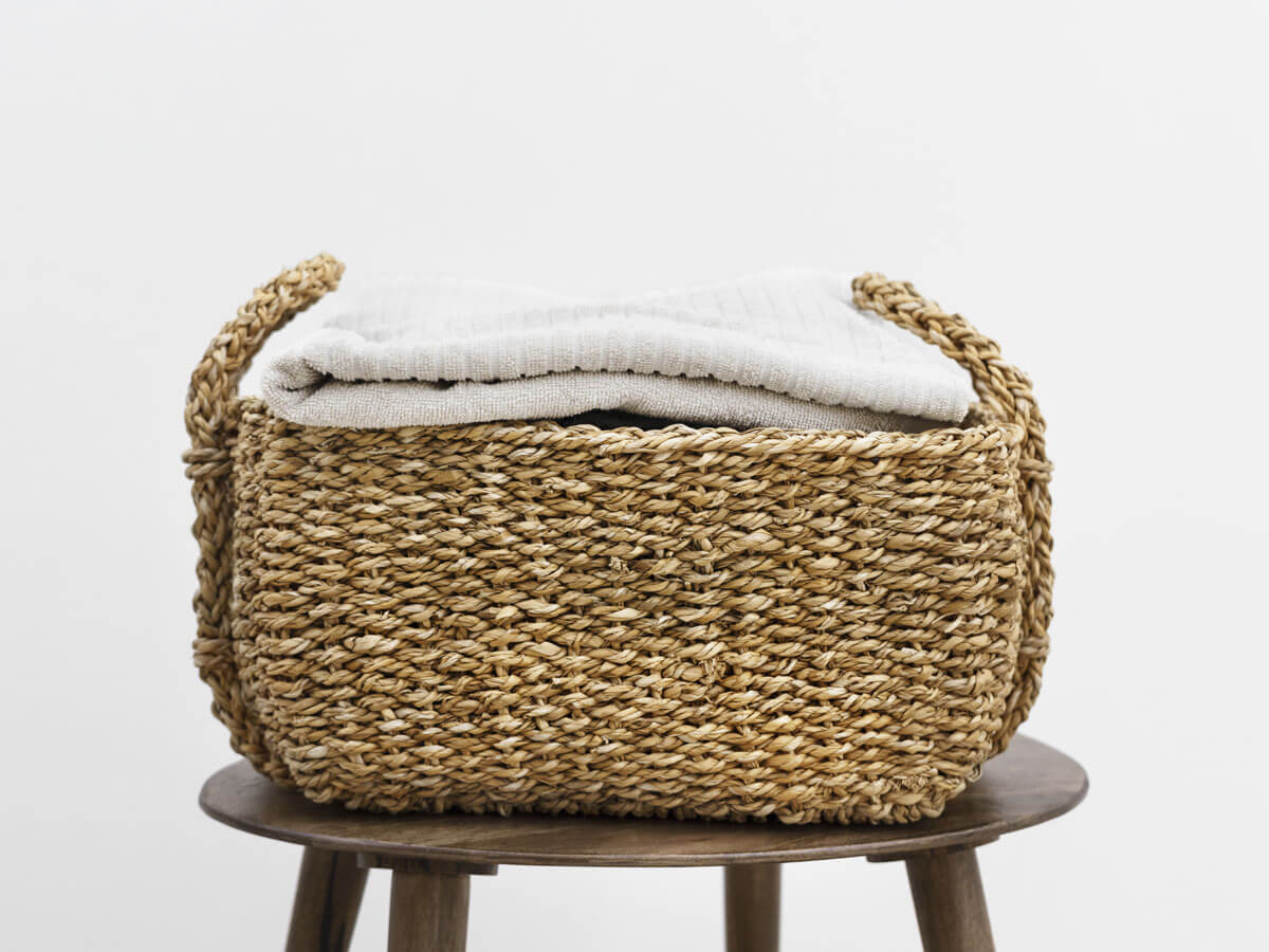 Woven seagrass, wicker, rattan or straw baskets are timeless and make great gifts