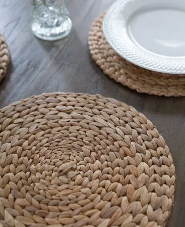 Woven water hyacinth table place mats similar to seagrass.